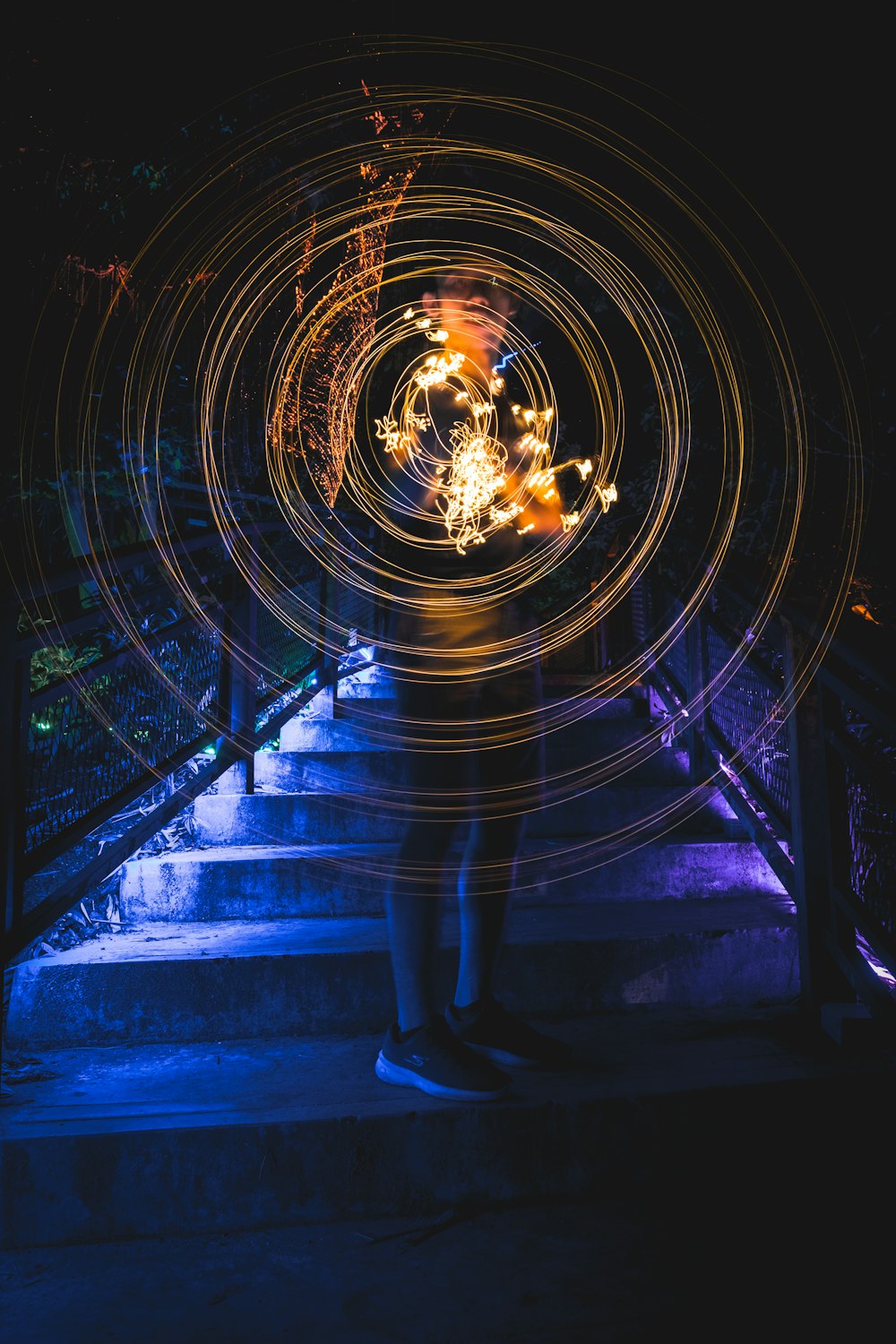 long exposure photography of unknown person holding firecracker