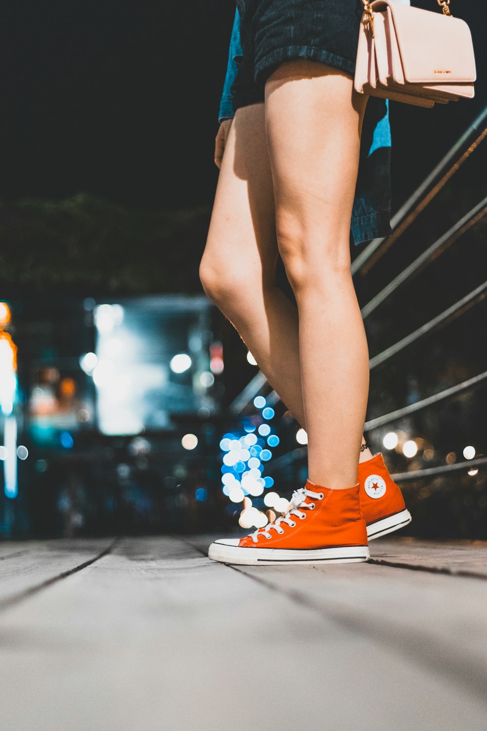 pair of red Converse high-tops