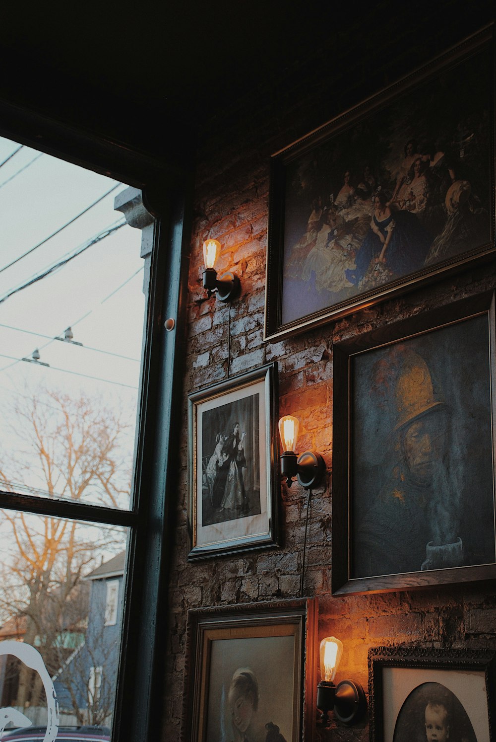 paintings on wall near window