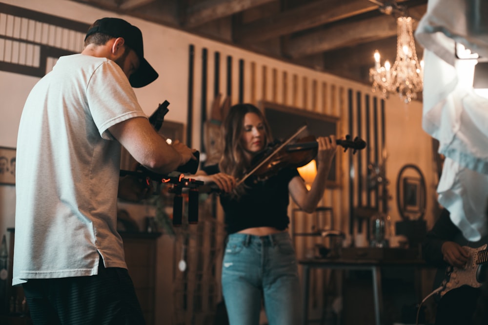 woman standing playing violin