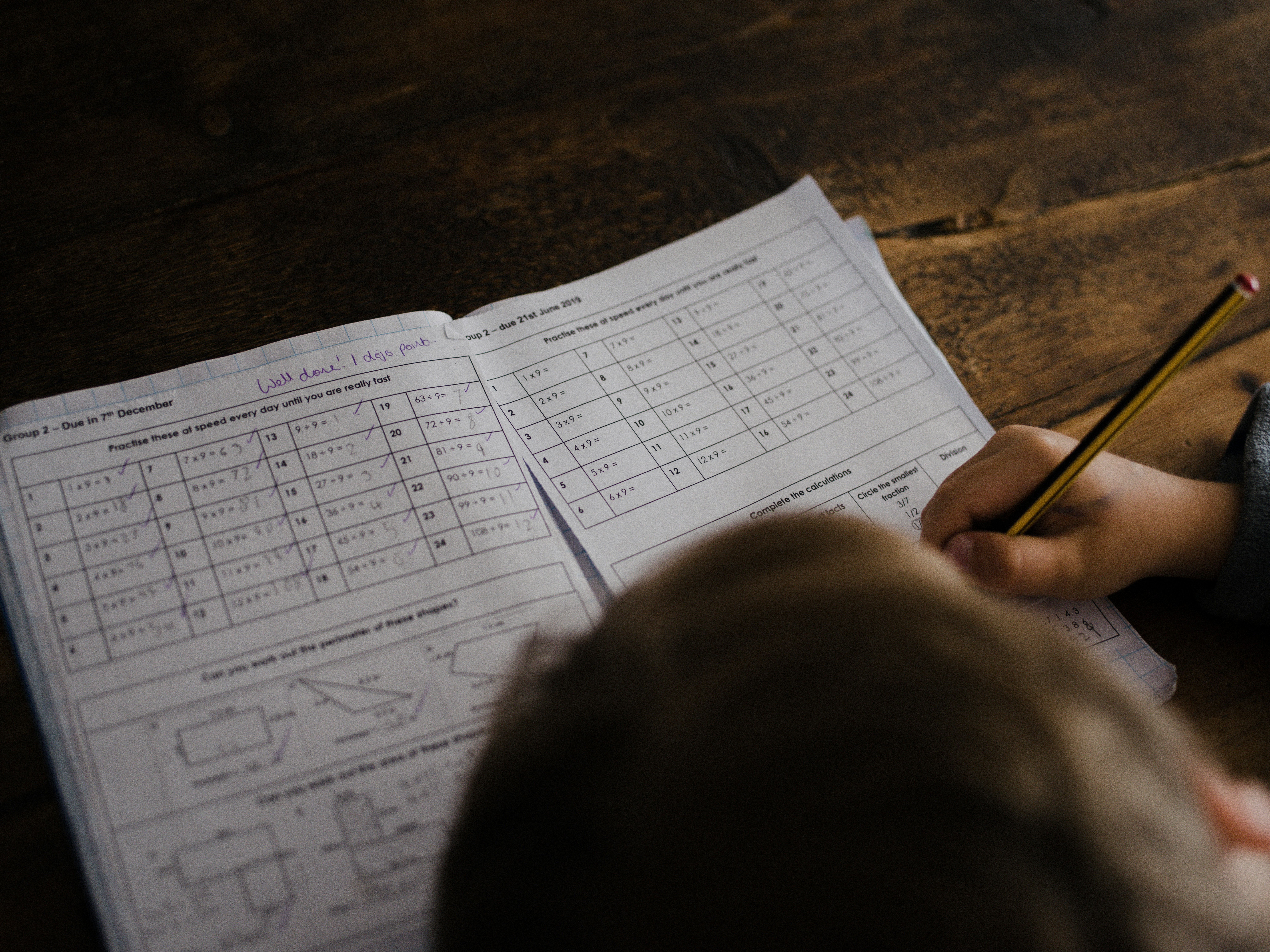 Child completing maths homework