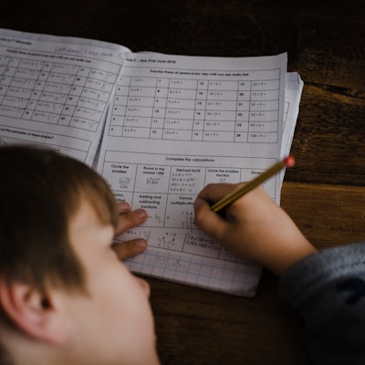 toddler writing indoors