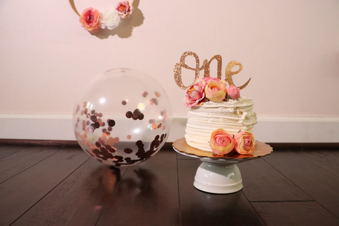Small round white thank you cake with simple piped lettering, made to order in Los Angeles