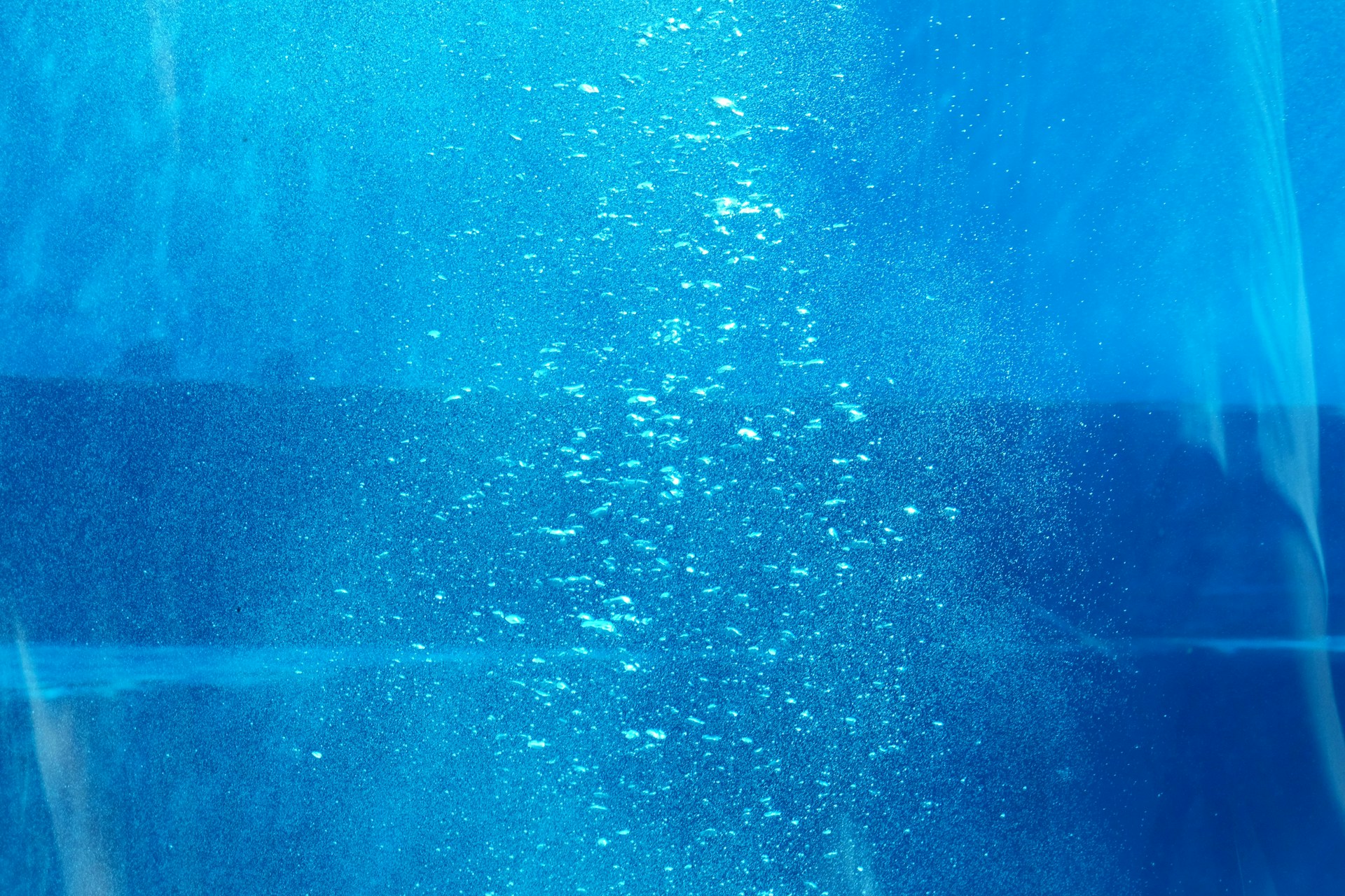 woman wearing yellow long-sleeved dress under white clouds and blue sky during daytime