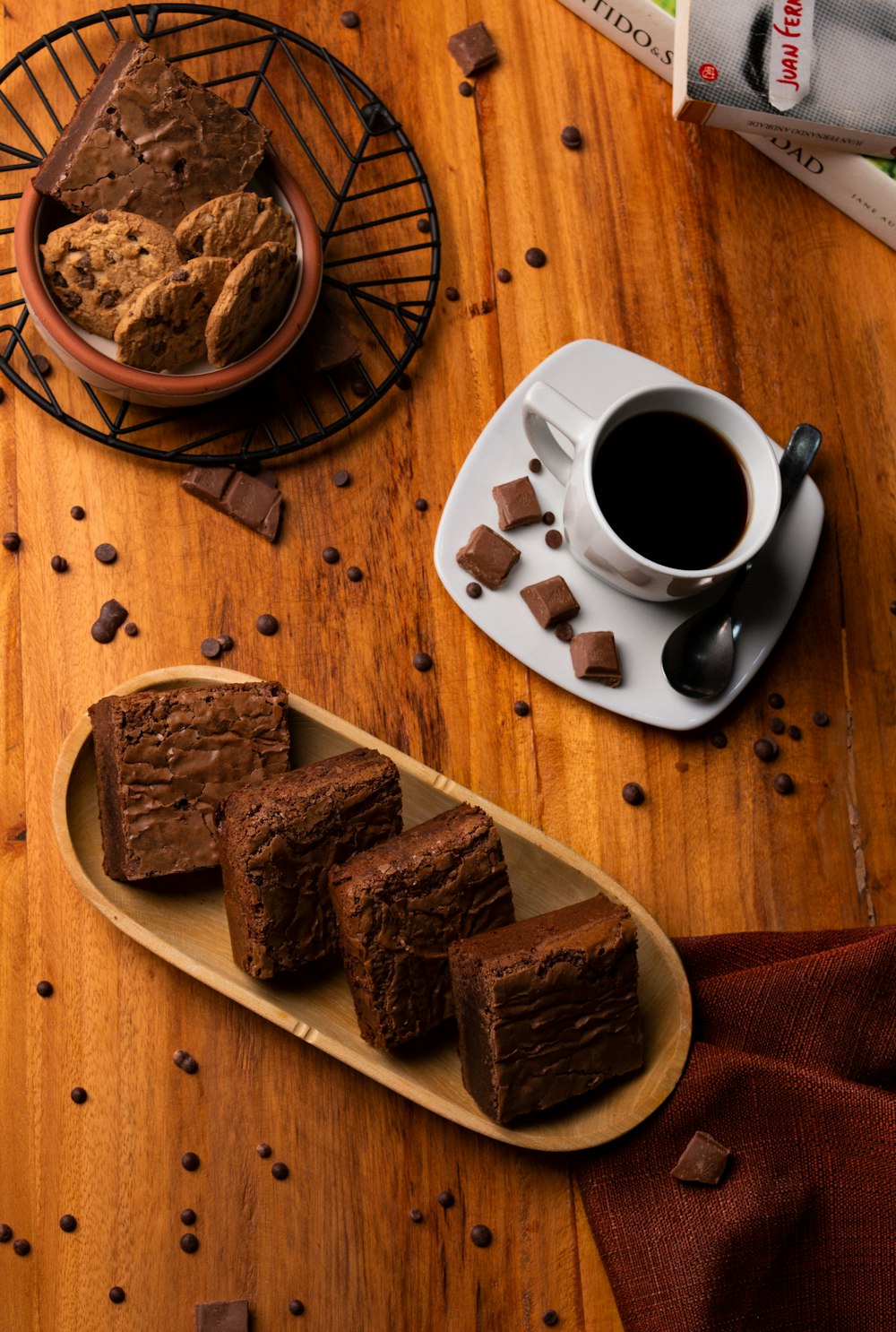 two plates and bowl beside coffee