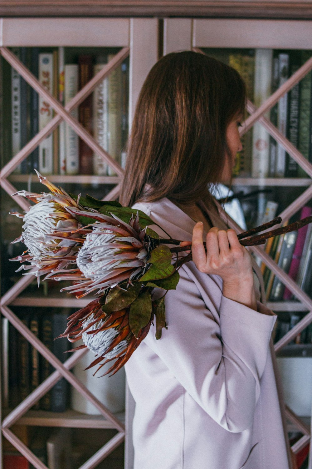 woman holding flower