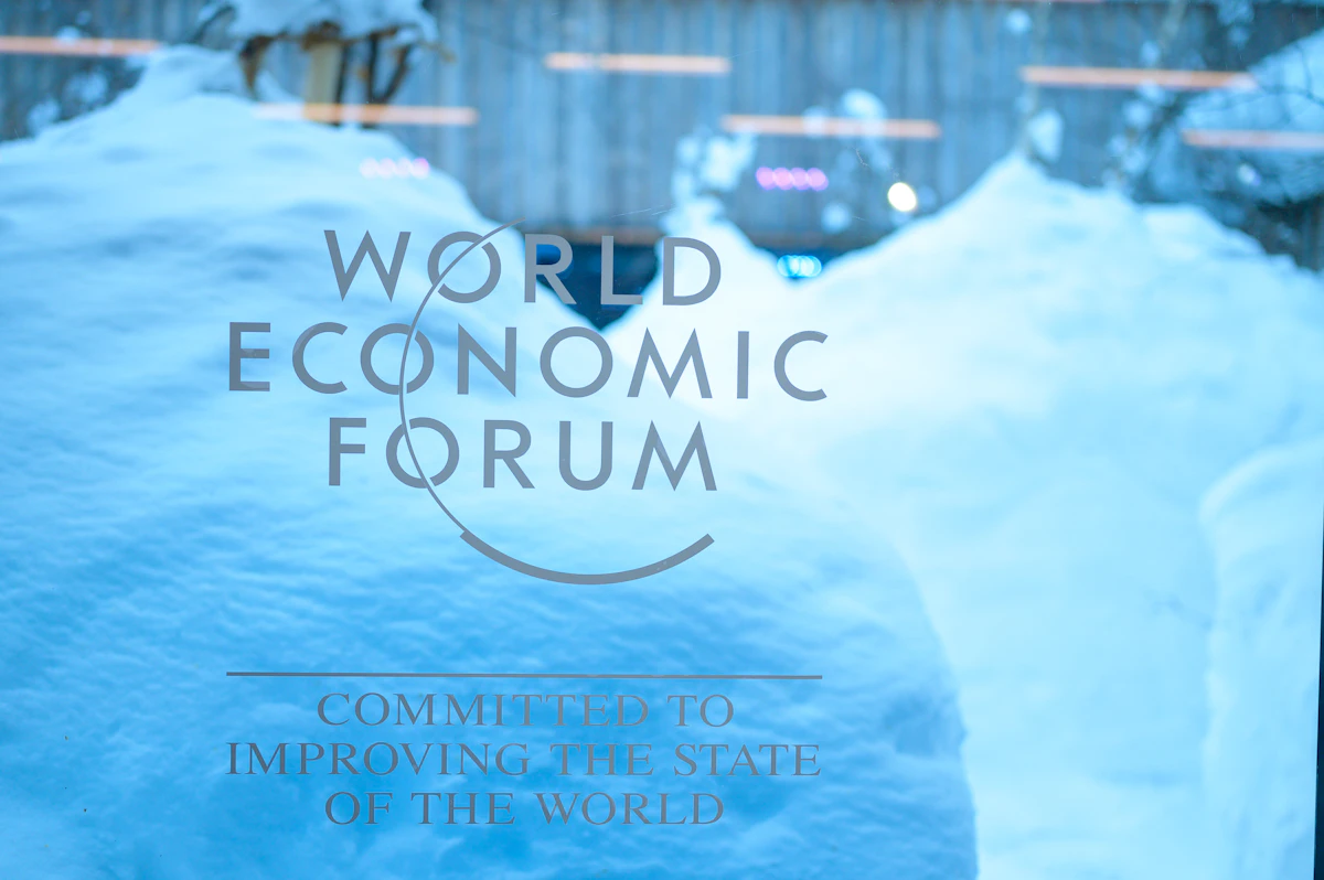 World Economic Forum sign at the Davos Congress Centre in winter