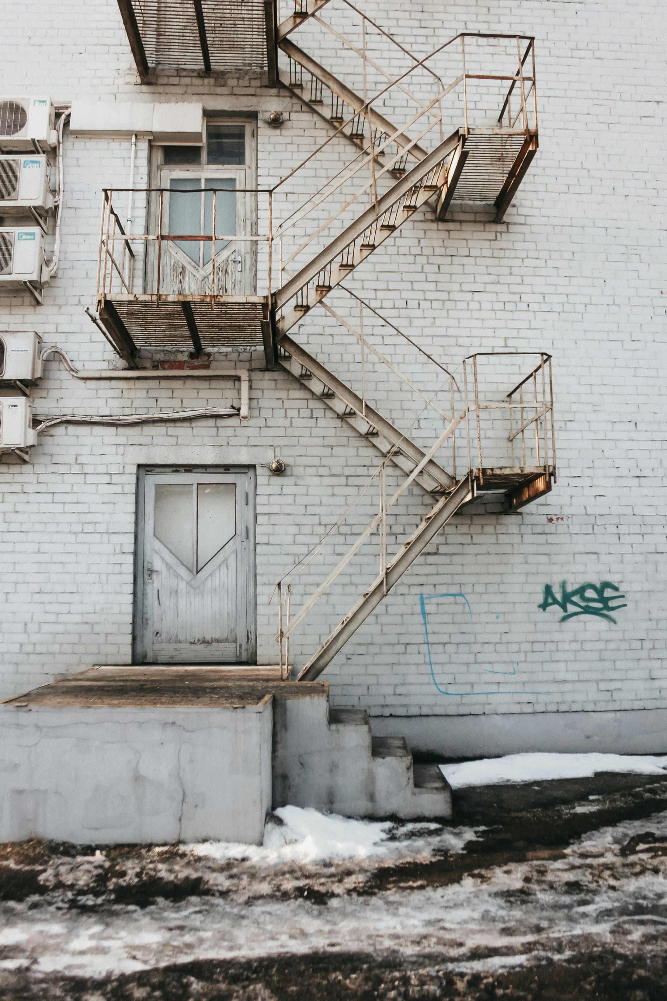 low angle photo of escape ladder