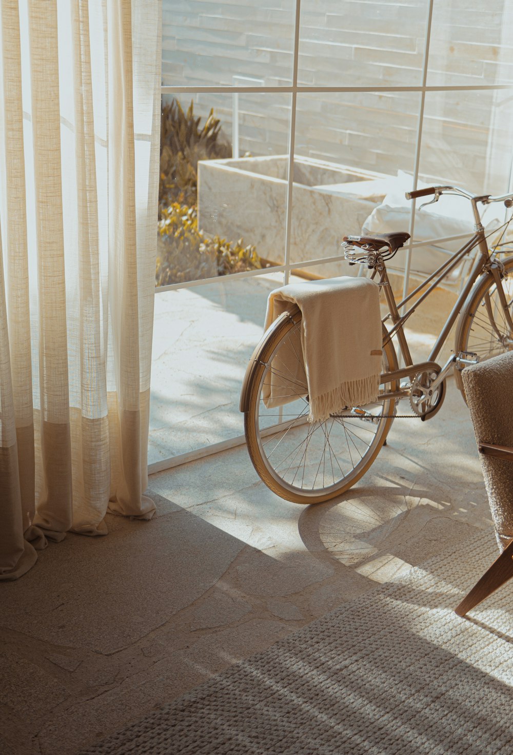 white bike near glass wall