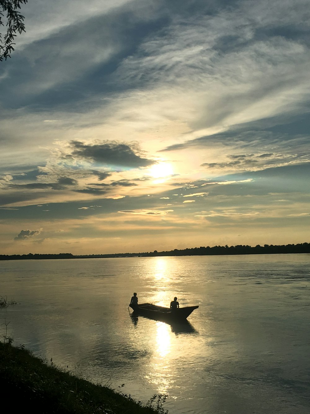 two men on boat in water