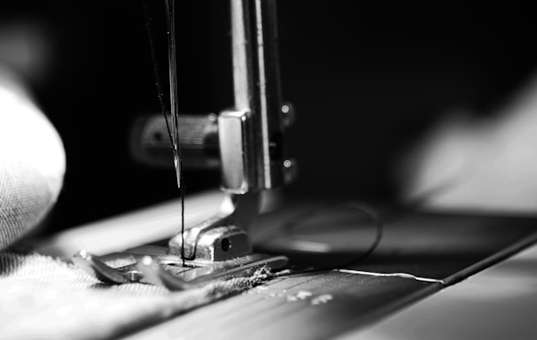 sewing machine grey-scale photography and close-up photography