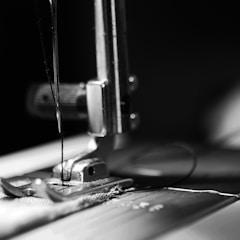 sewing machine grey-scale photography and close-up photography