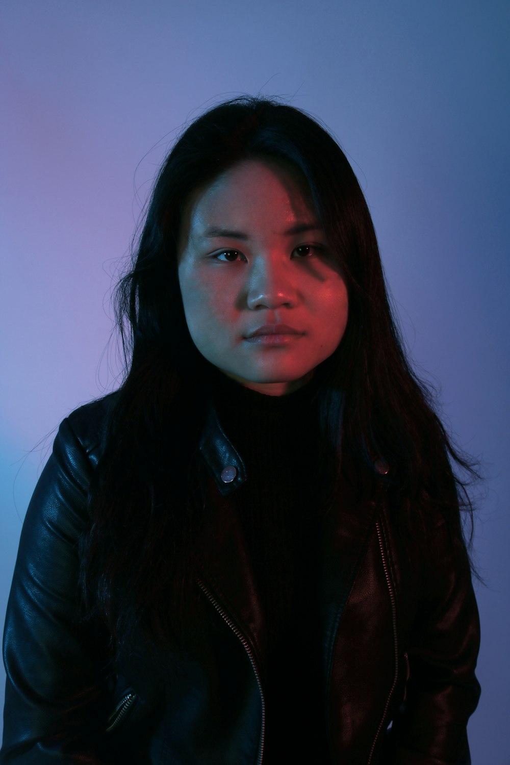 woman wearing black leather jacket