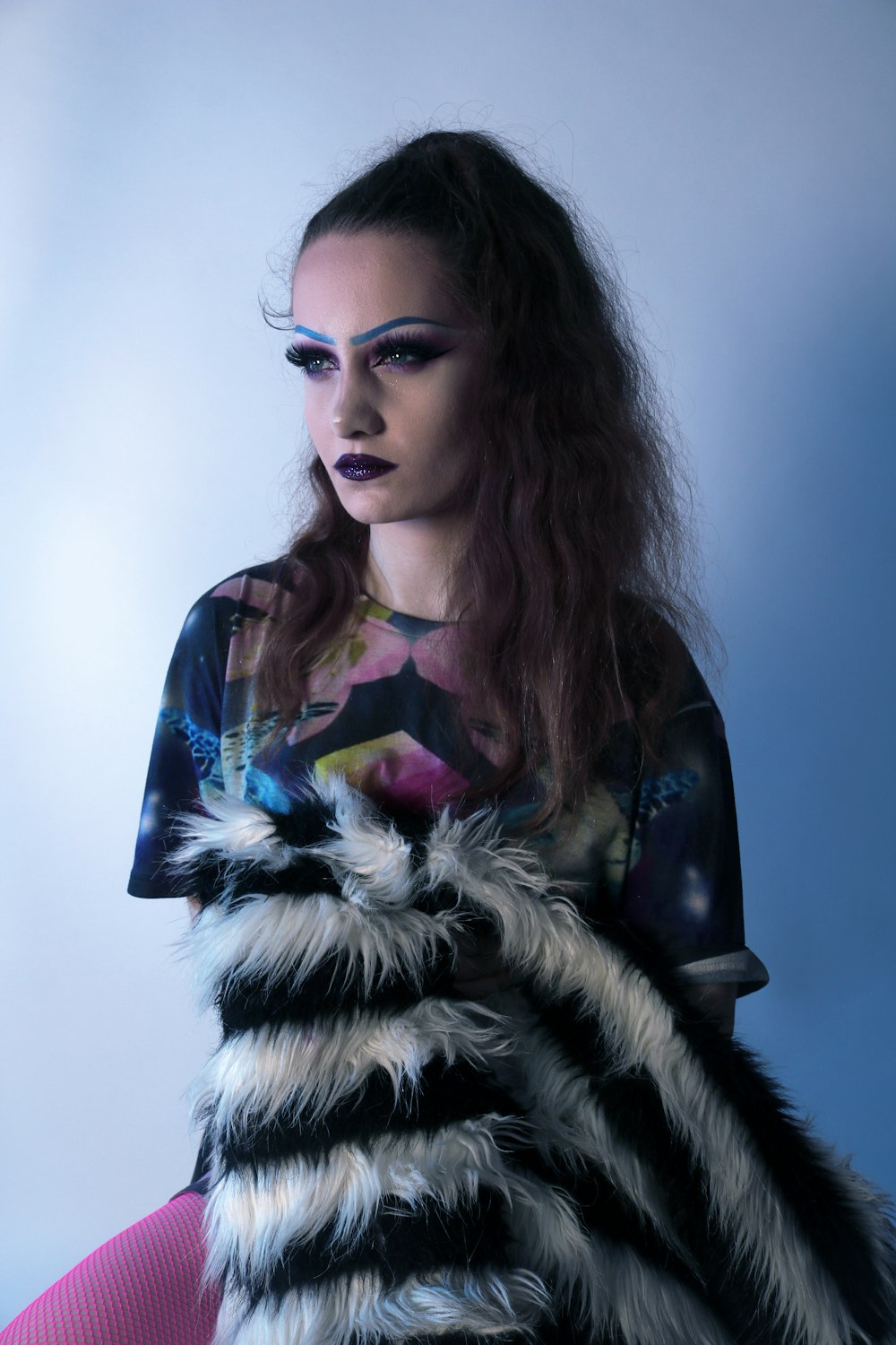 person wearing a fury dress in a room close-up photography
