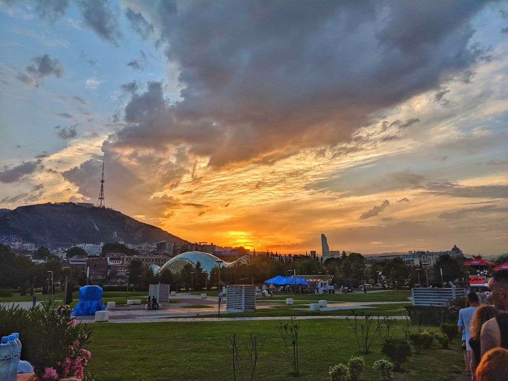 people in park at sunset