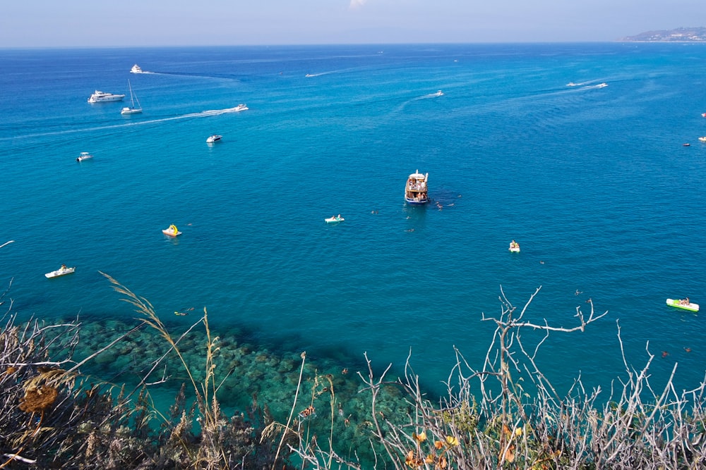 aerial photography of brown boat on sea during daytime