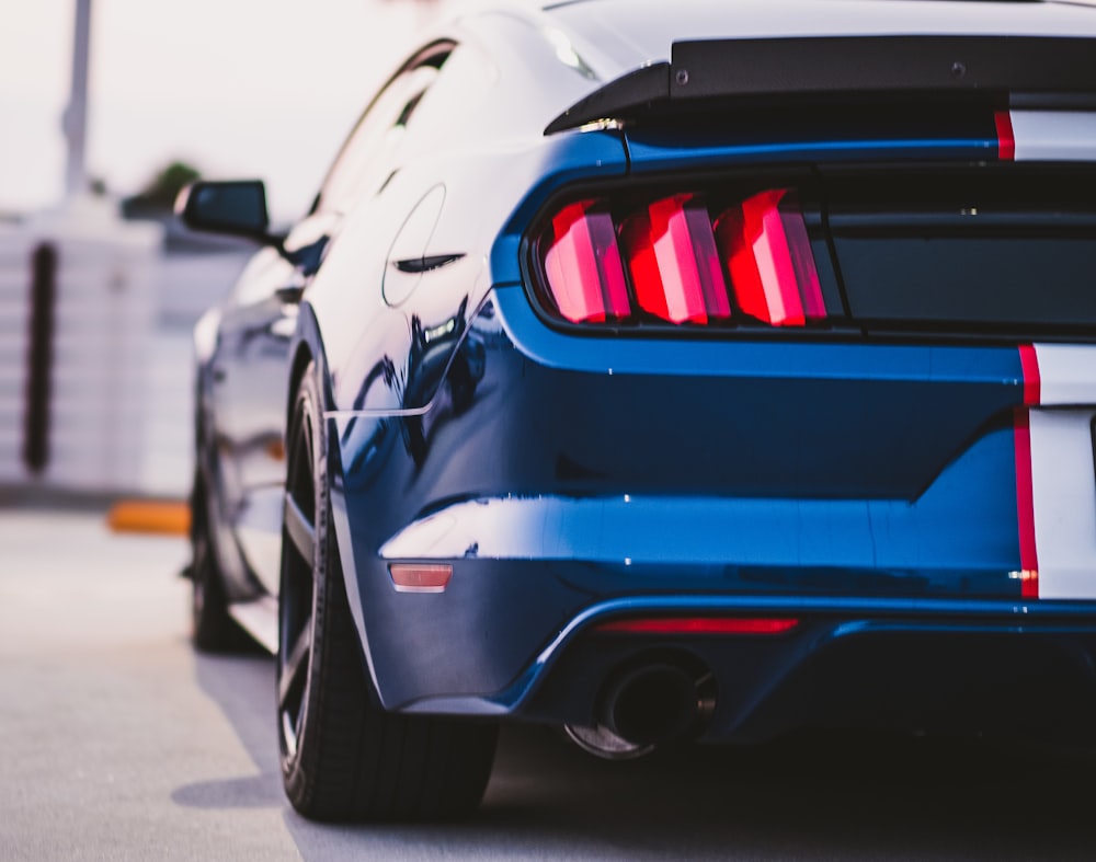 Black Ford Mustang On Gray Pavement Photo Free Grey Image On Unsplash