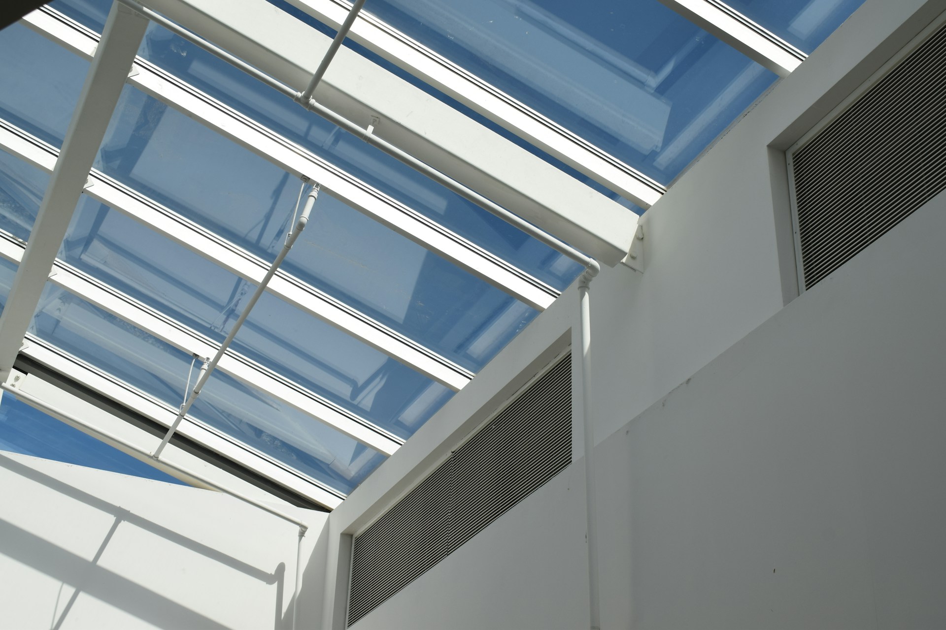 woman wearing yellow long-sleeved dress under white clouds and blue sky during daytime