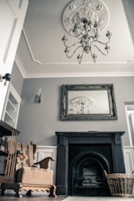 silver-colored chandelier hanging in a room close-up photography