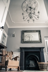 silver-colored chandelier hanging in a room close-up photography