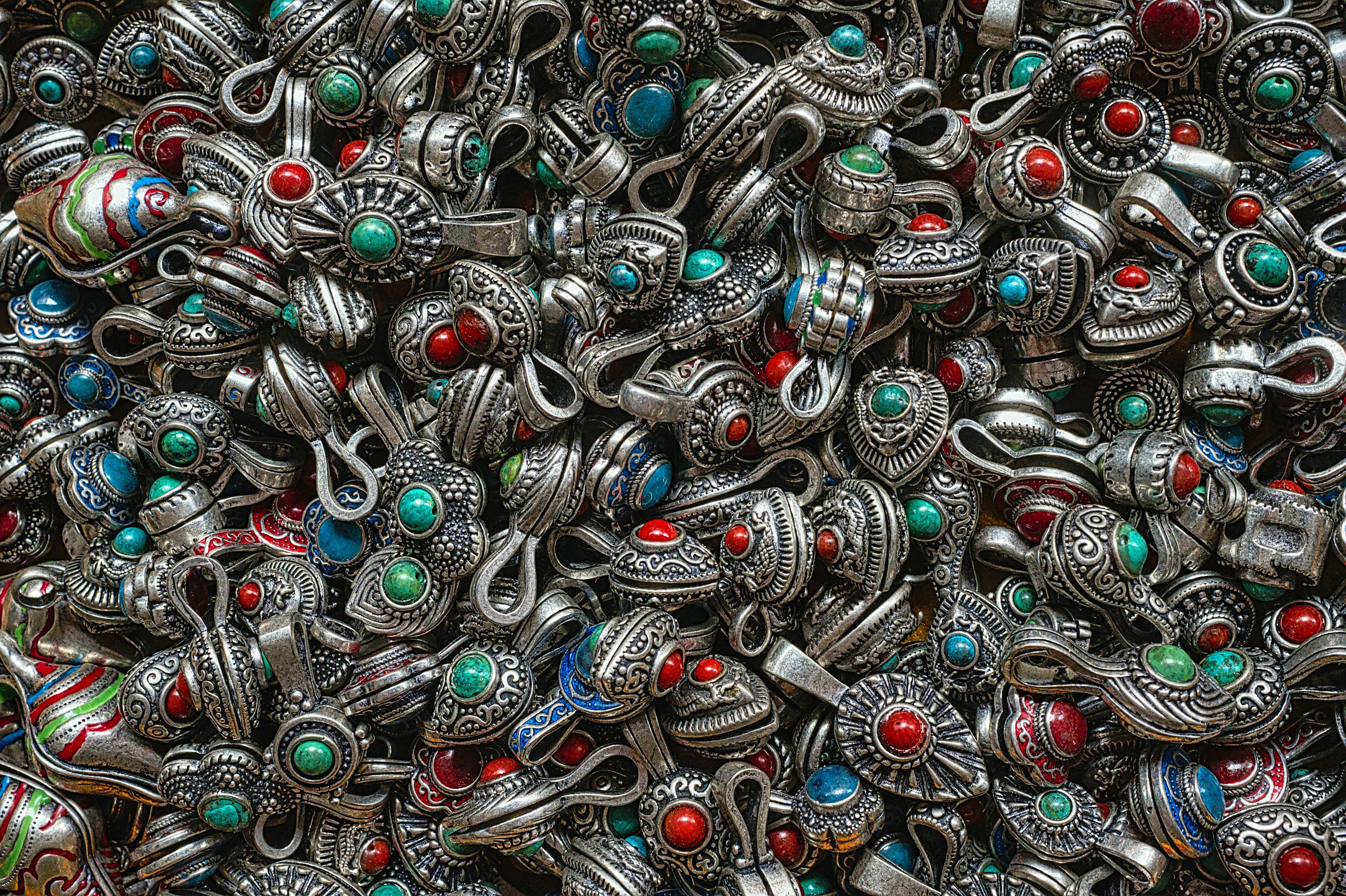 silver-colored and green accessory lot