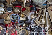 assorted-color metal vase and containers