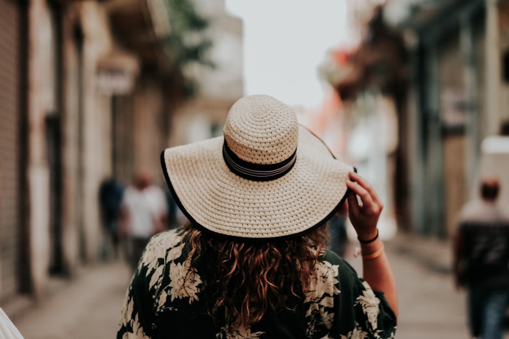 woman wearing sun hat