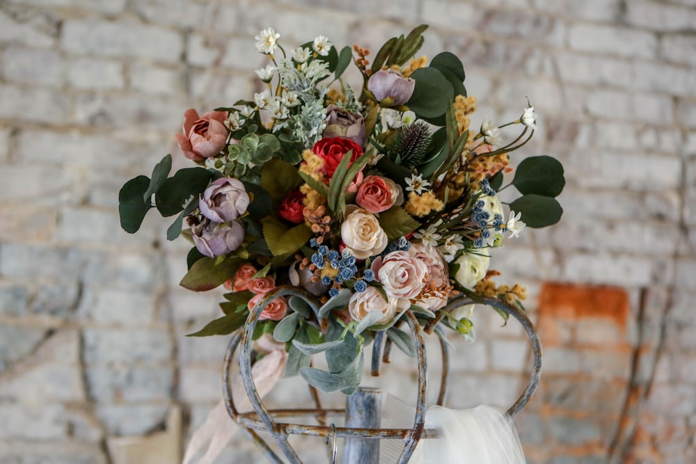 assorted-color flowers on rack