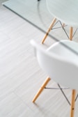 two white and brown wooden Eiffel chairs