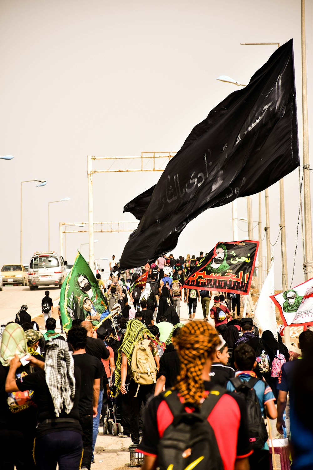 group of person protesting outdoors