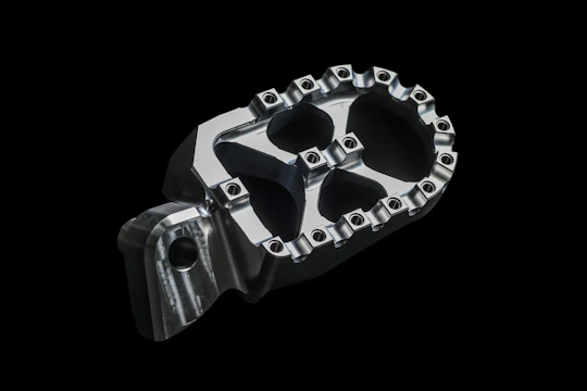 A sleek black 3D printed mechanical part highlighting precision and strength