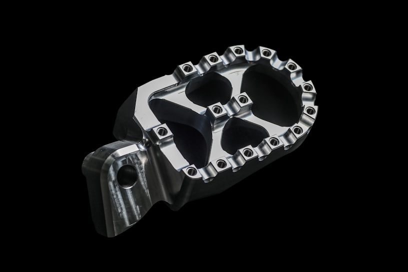 A high-resolution image of aerospace spare parts displayed on a table.