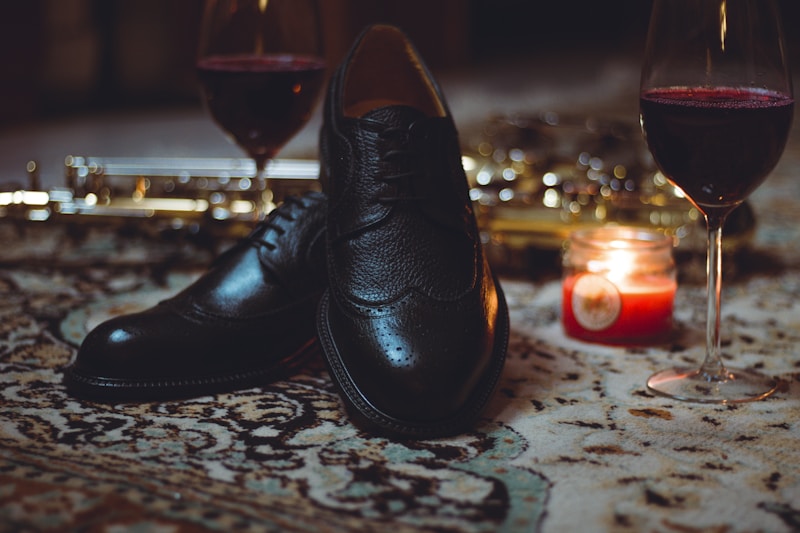 pair of black dress shoes