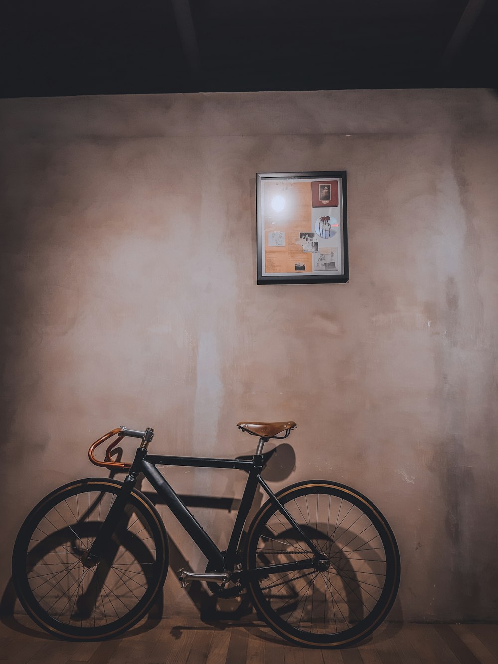 black bicycle near wall