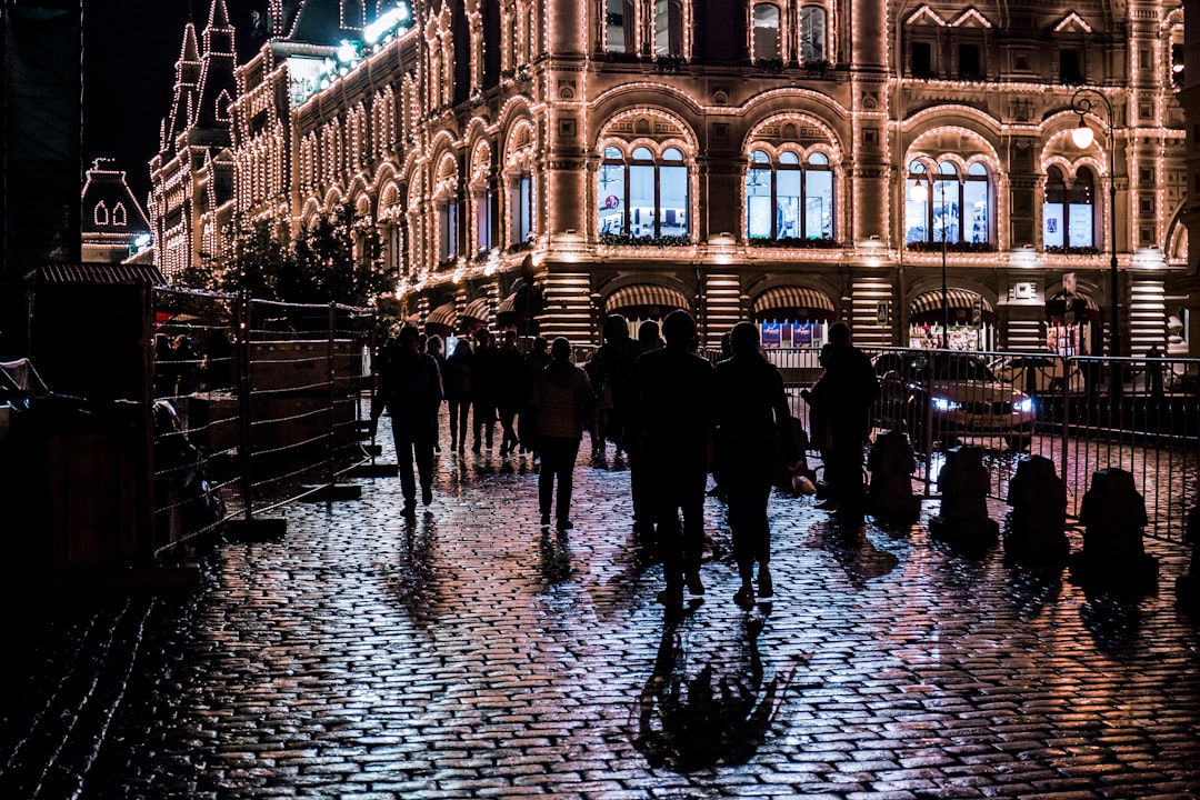 people walking near outdoor during nighttime