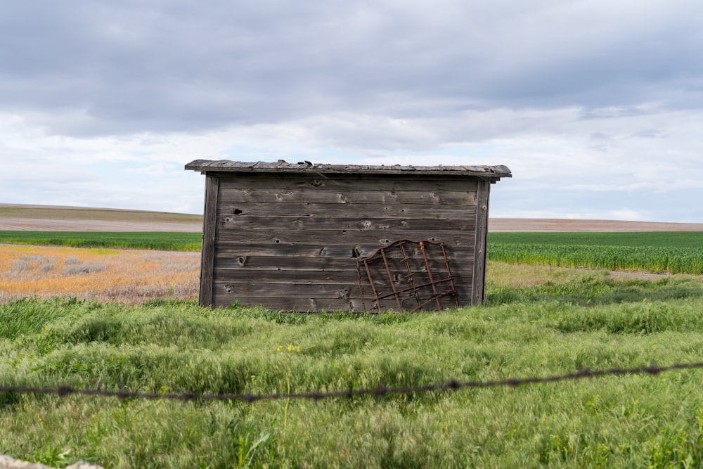 brown wooden tool shed