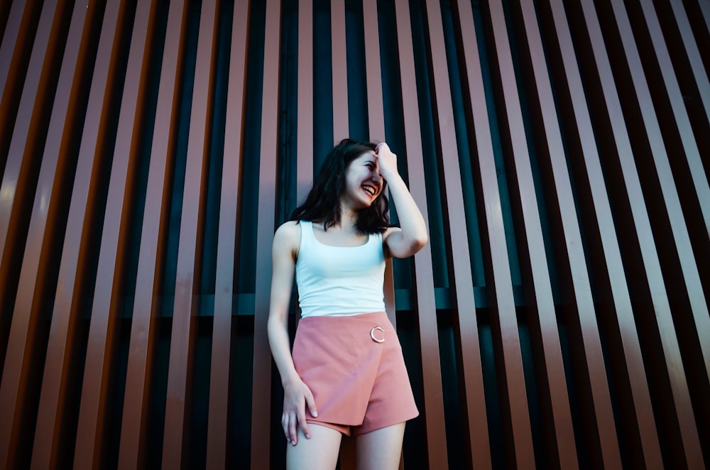 women holding her head close-up photography