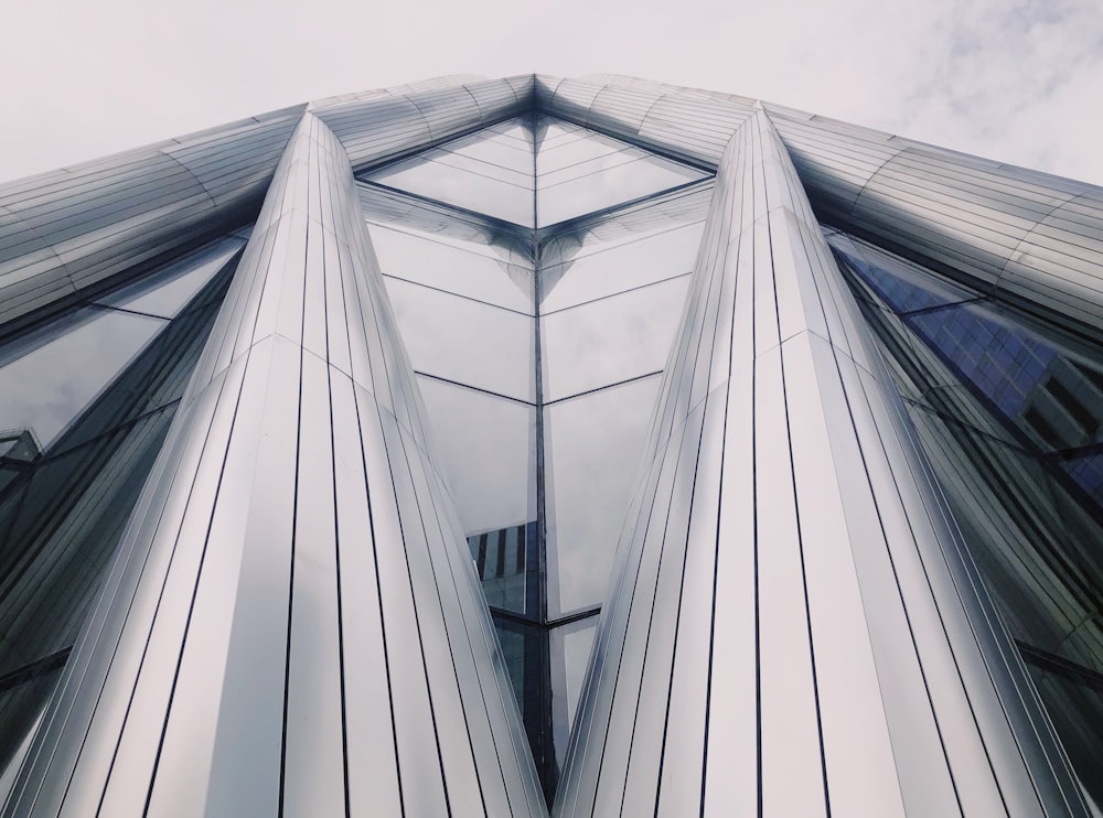 low-angle photo of curtain wall building