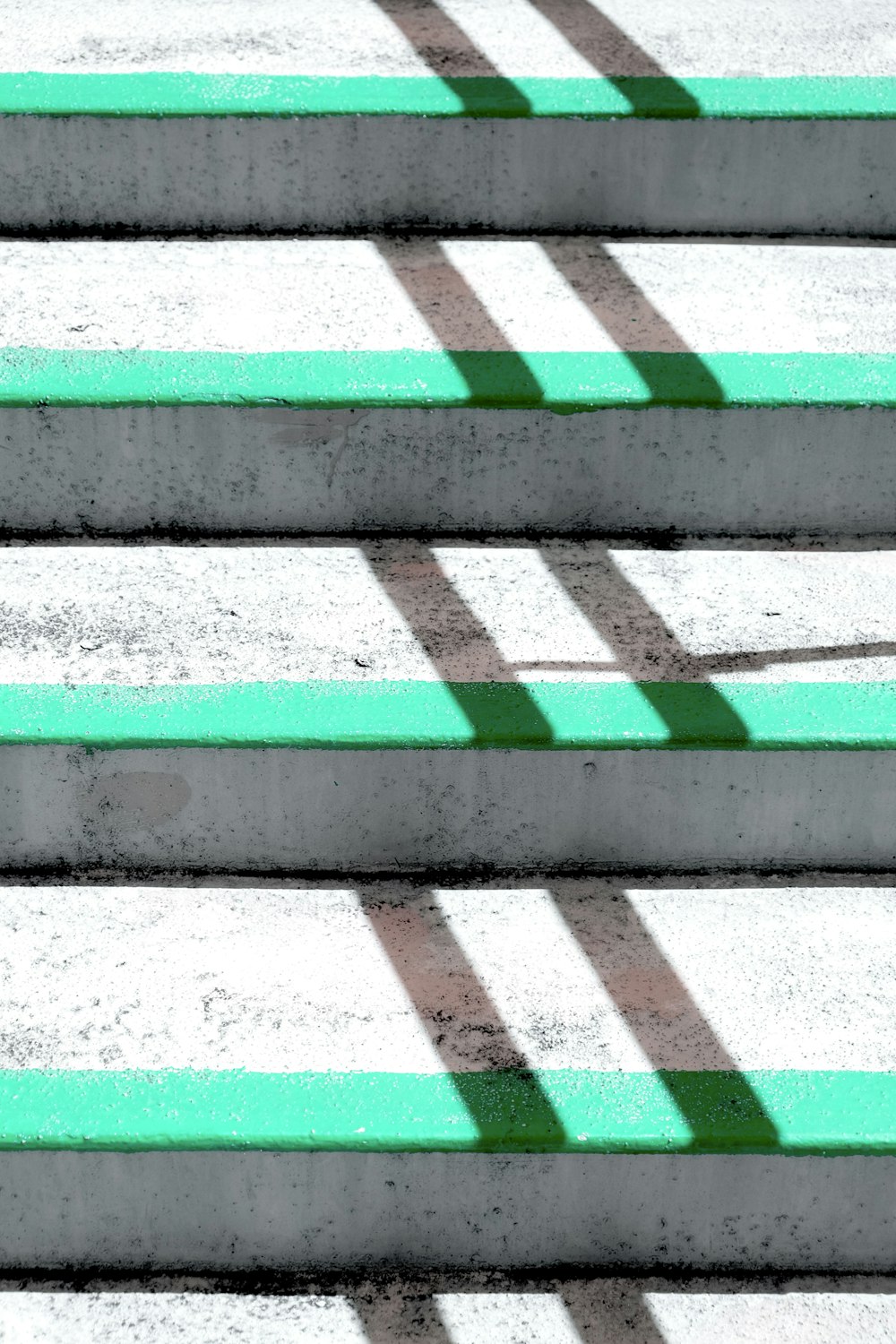 a close up of a set of green and white stairs