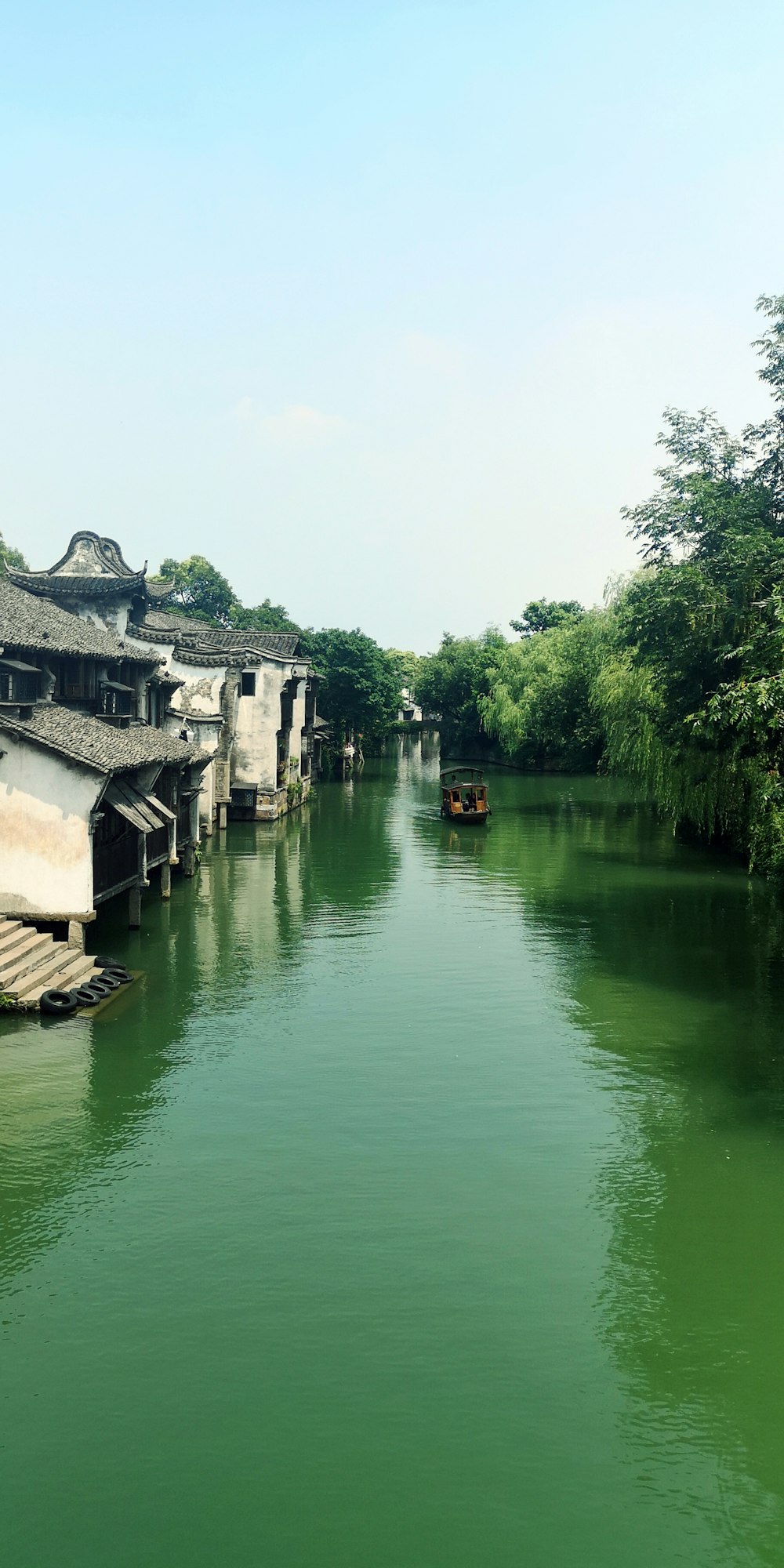 river surrounded by houses