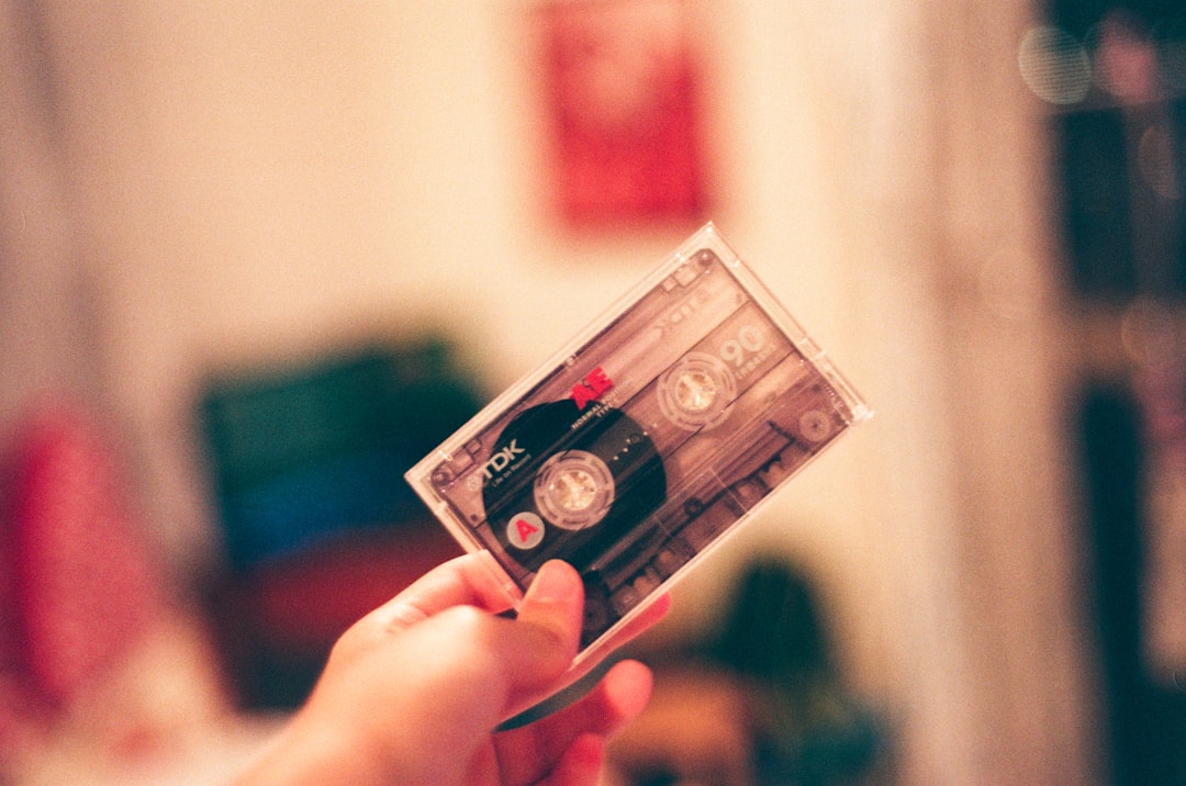 person holding tape