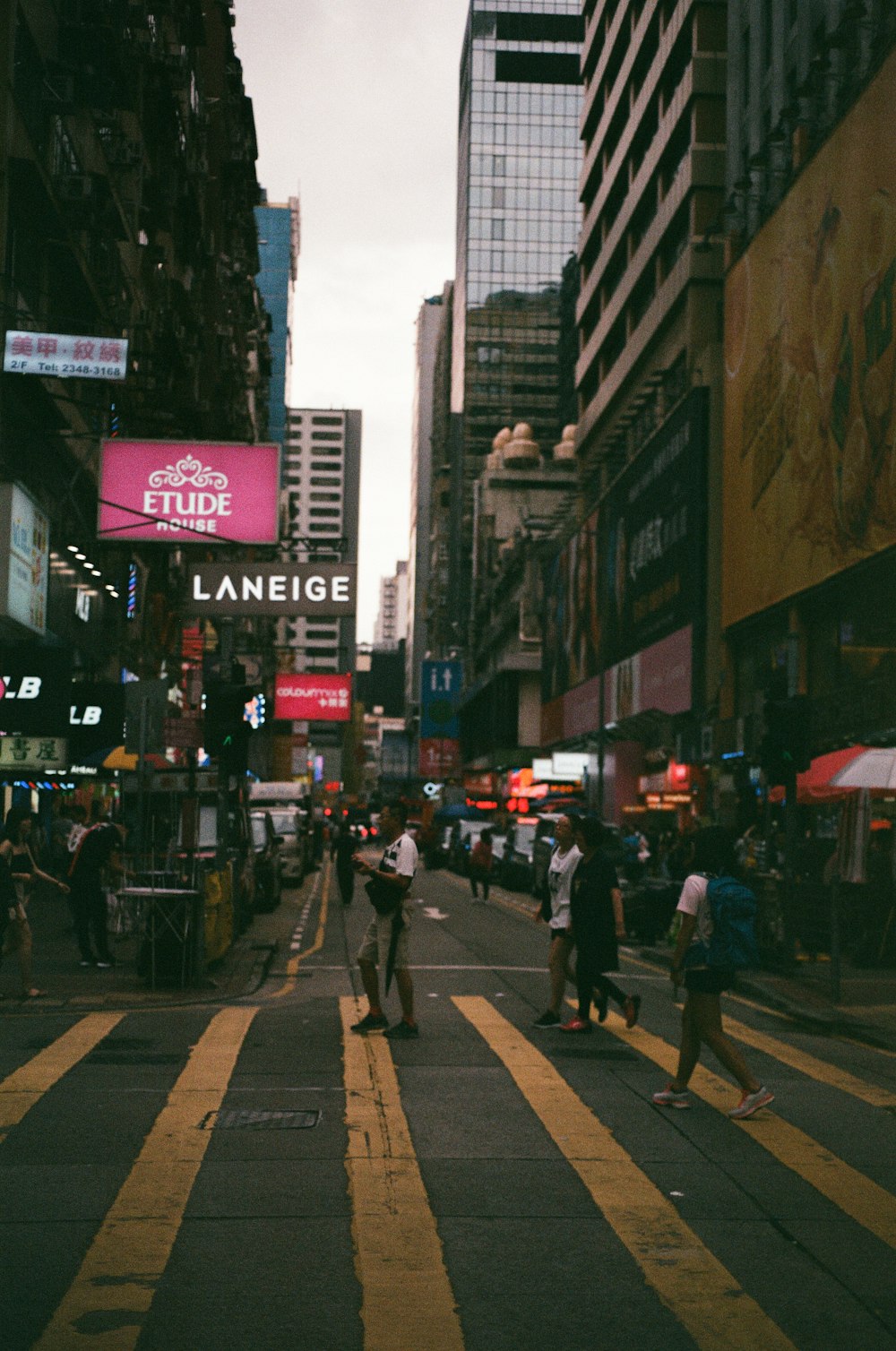 people walking in pedestrian lane during daytime