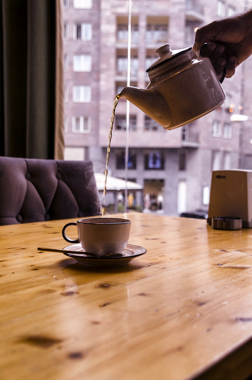 white ceramic teapot and ceramic teacup