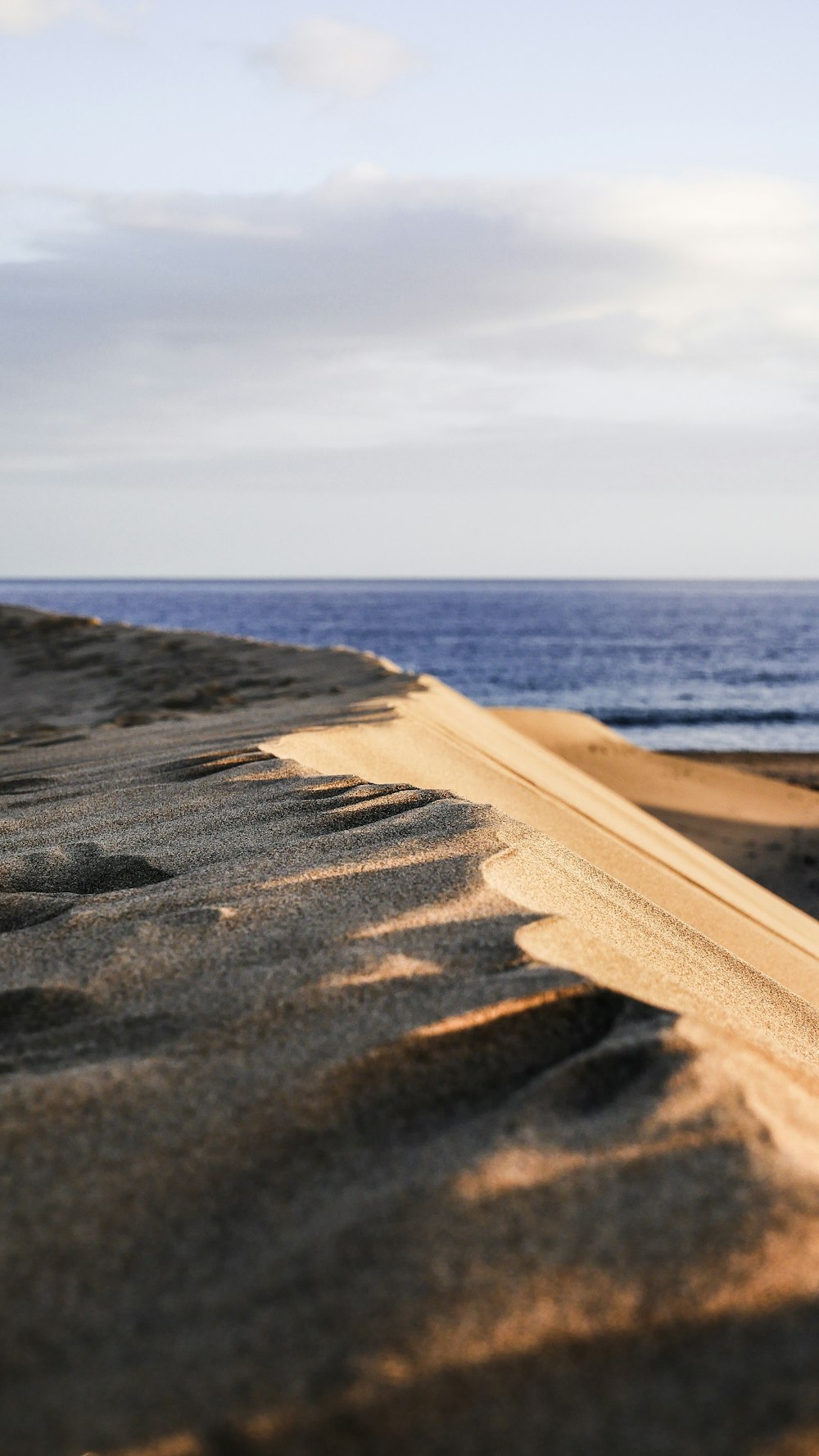 sand shore during day