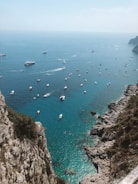 A scenic view of the Alicante coastline with boats.