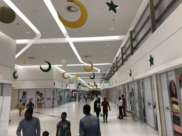 Happy family shopping together at Sahb Al Nada, highlighting community feel.