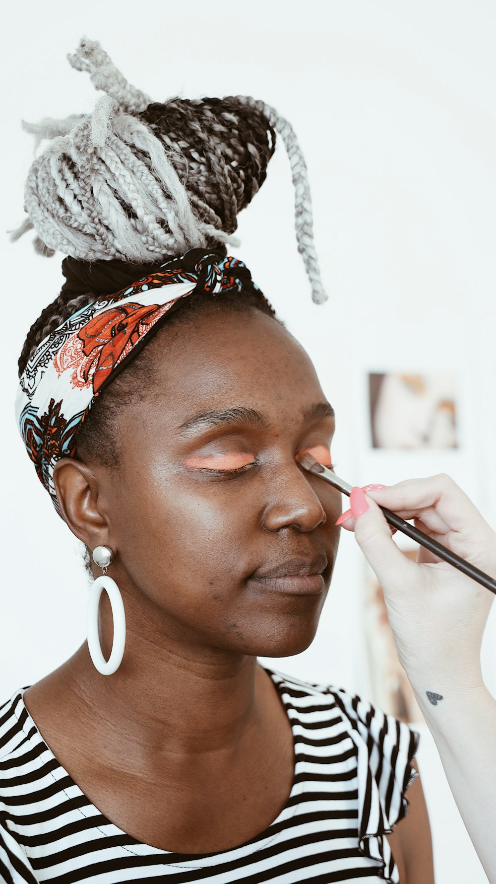 woman receiving makeup