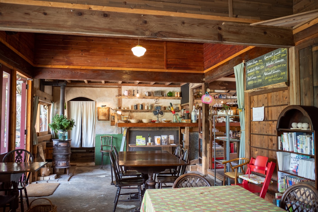 tow dining tables inside wooden house