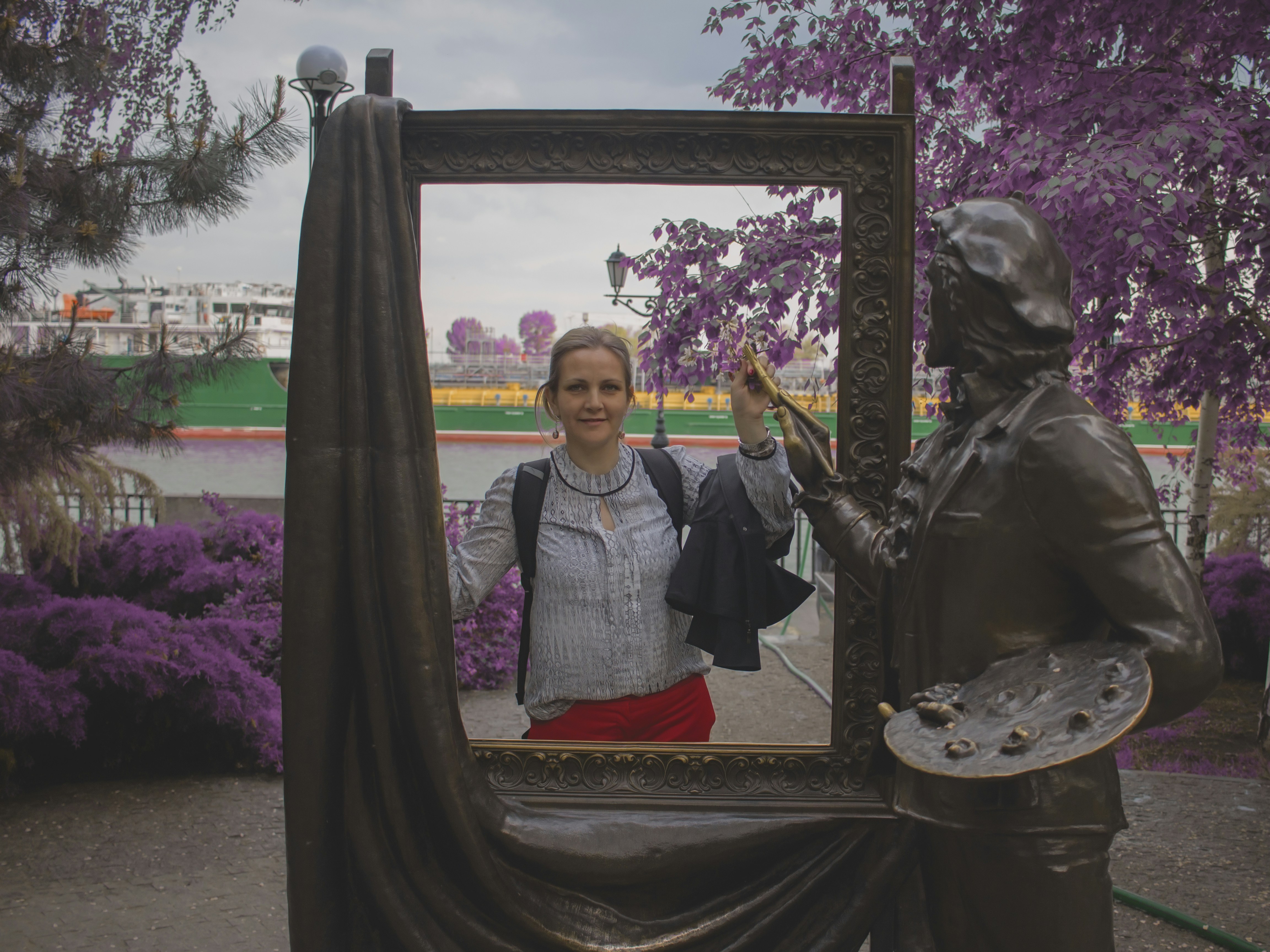 woman near sculpture