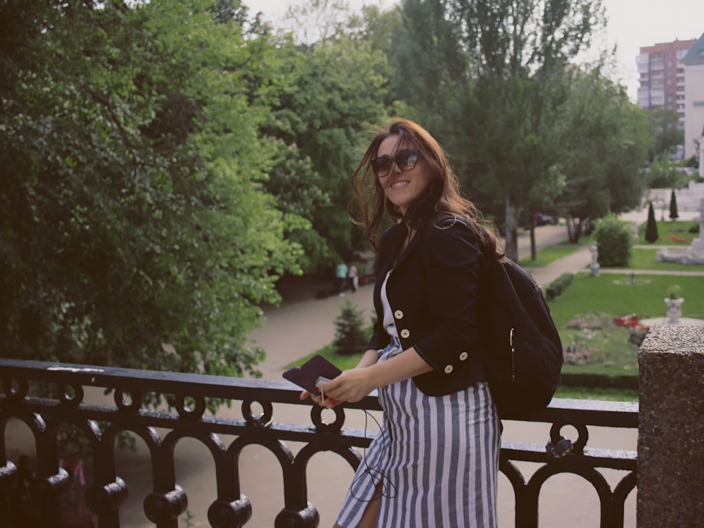 woman standing near railing